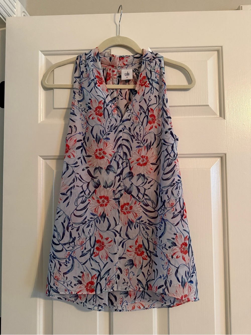CAbi Floral Sleeveless V-Neck Blouse in Light Blue and Coral